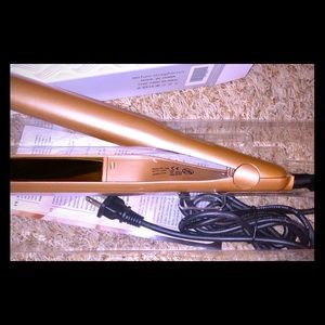 Hair straightener and curler.